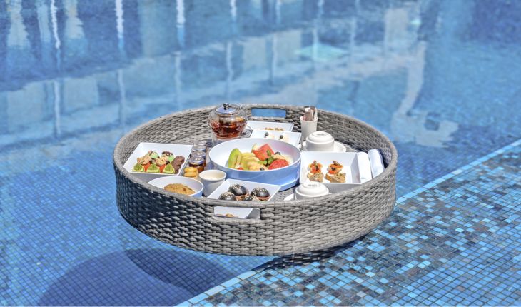Relax: Experience the hotel’s floating breakfast by the poolside