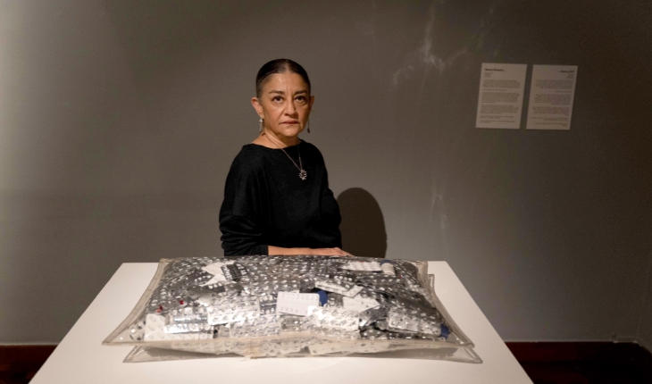 CRISIS: Ghada with her piece ‘Sweet Dreams’ in the first section of the exhibition