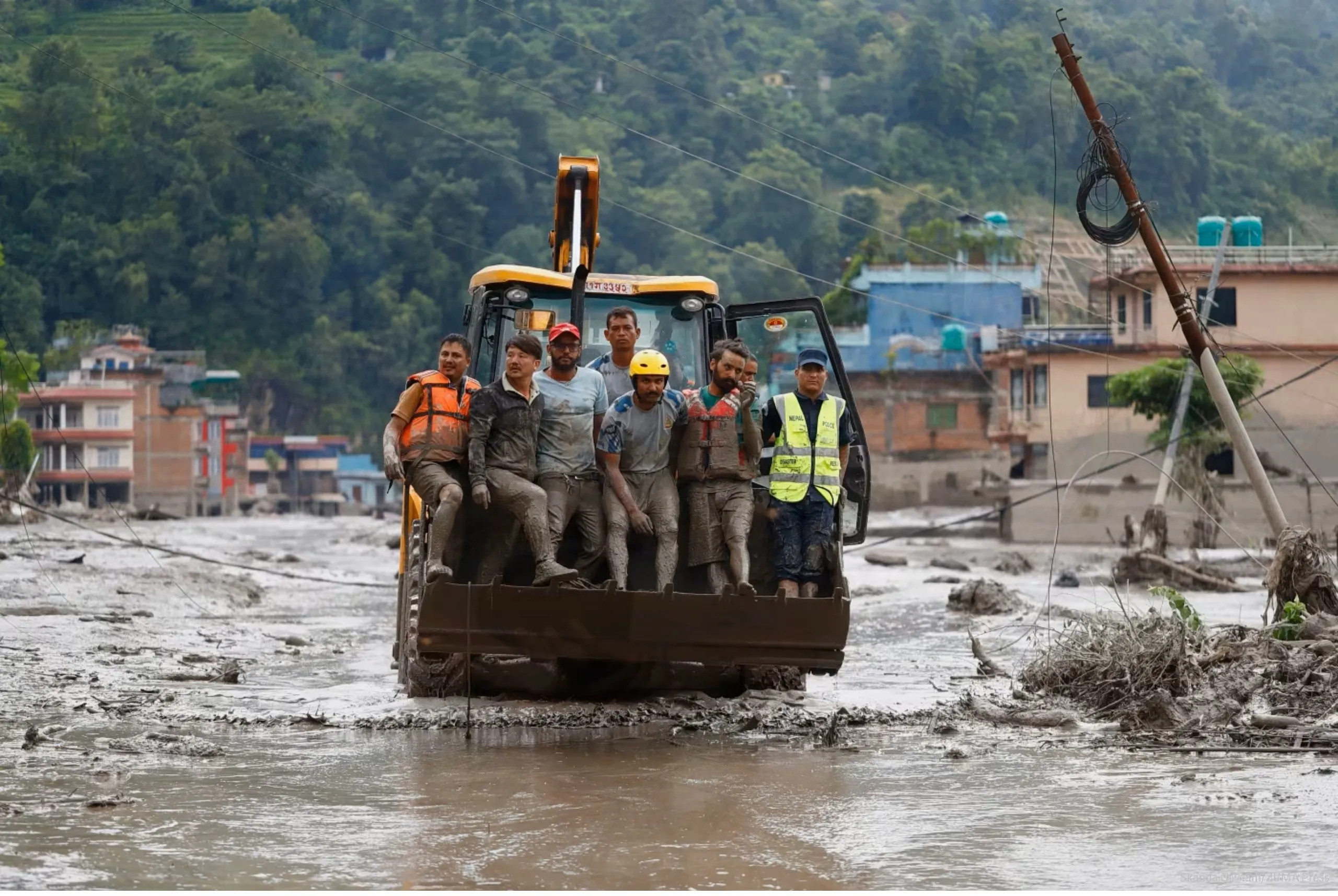 Over 300 dead, 1,000 missing after deadly flash floods hit China, Nepal