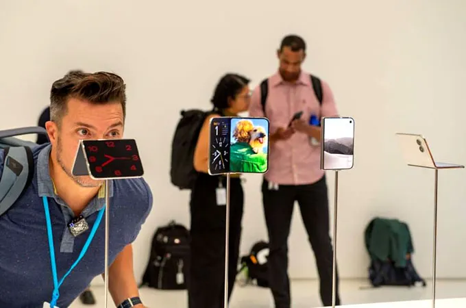Apple enters foldable phone race with new passport-shaped iPhone